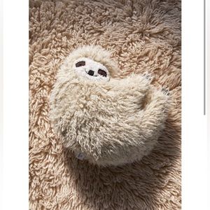 Urban outfitters furry sloth pillow